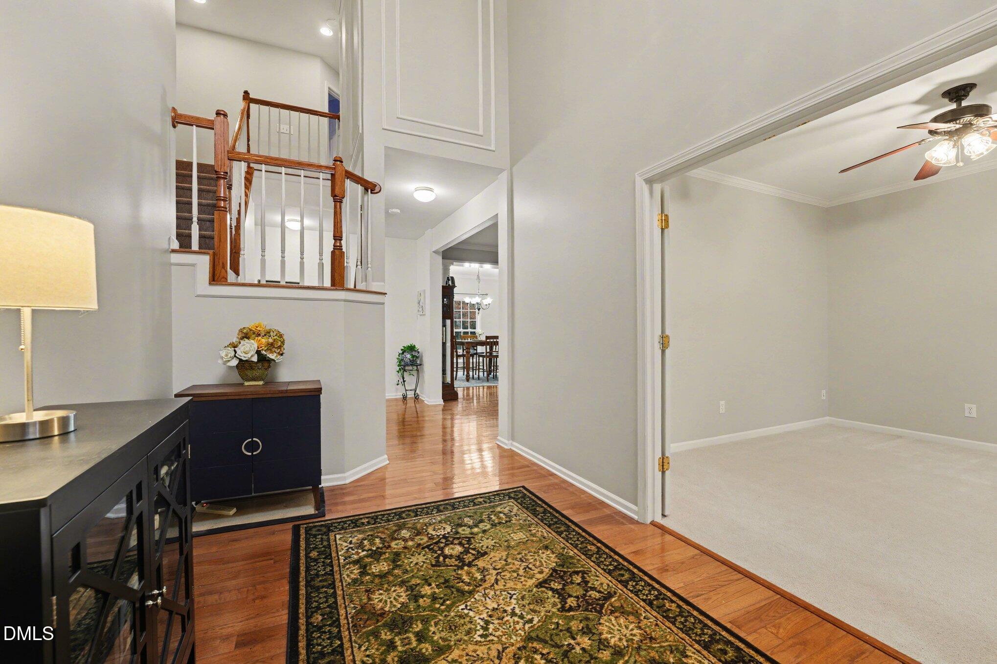 2505 Wyatt Lane Raleigh, NC 27614 - Photo 7 of 54 a view of a hallway to a livingroom with furniture