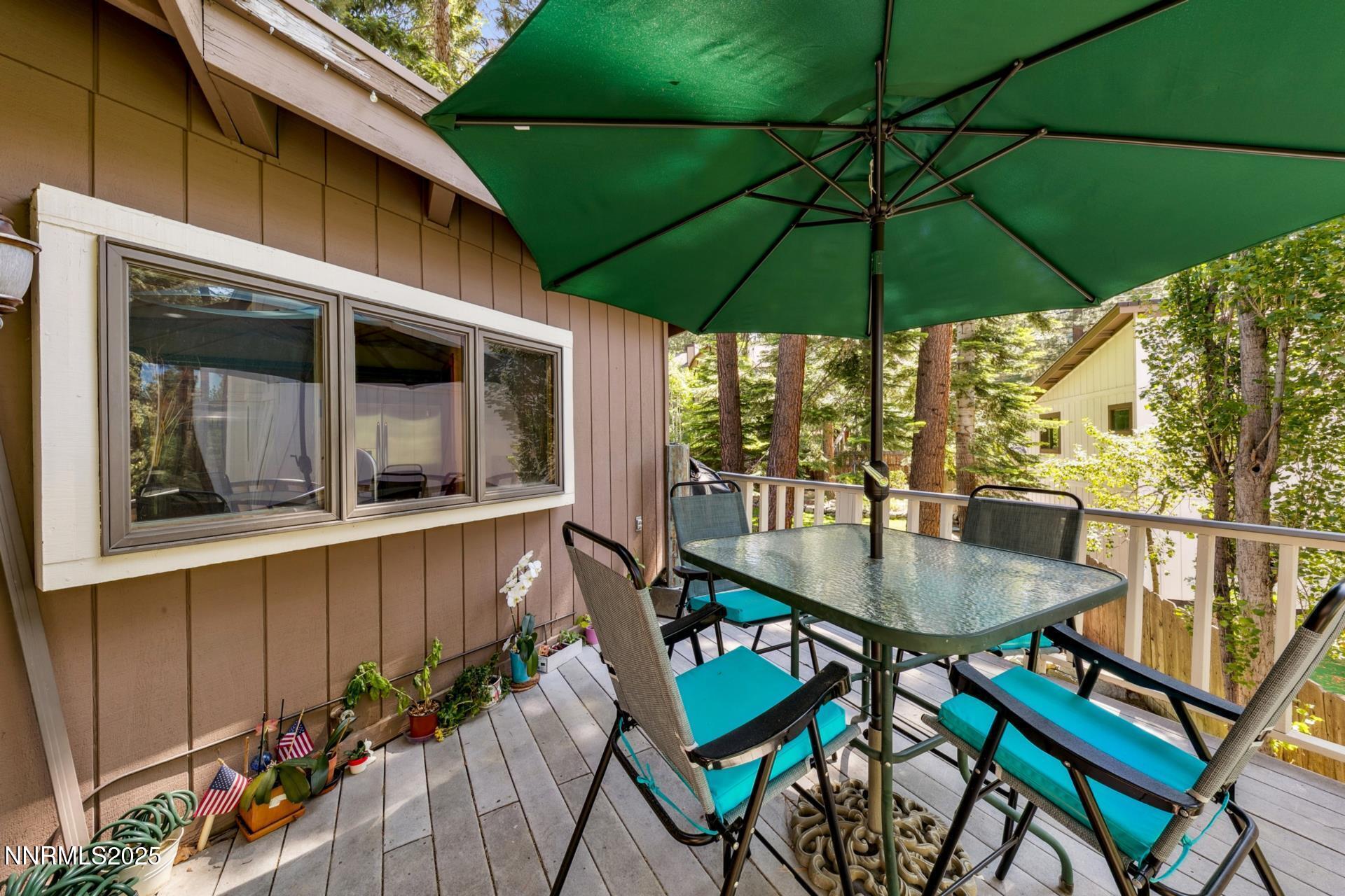 173 Hall Court Stateline, NV 89449 - Photo 15 of 32 a table and chairs in patio of a house