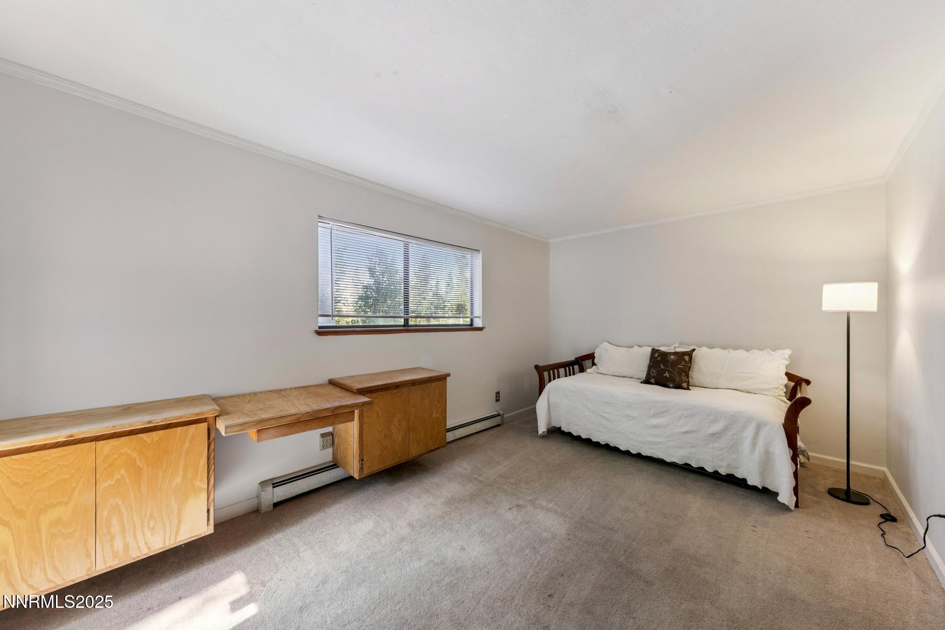 173 Hall Court Stateline, NV 89449 - Photo 23 of 32 a bed room with furniture and a window