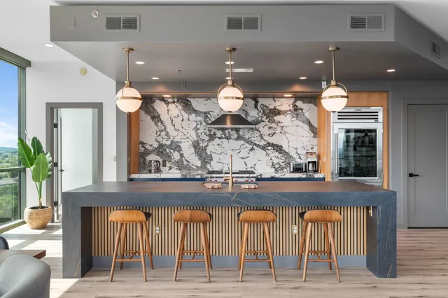 a view of lobby with furniture and floor to ceiling window