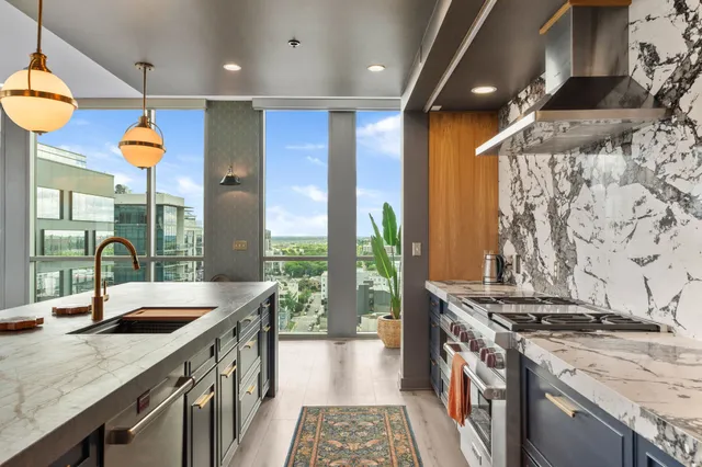a view of a balcony with chairs