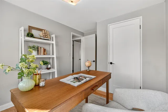 a dining room with a table and chairs
