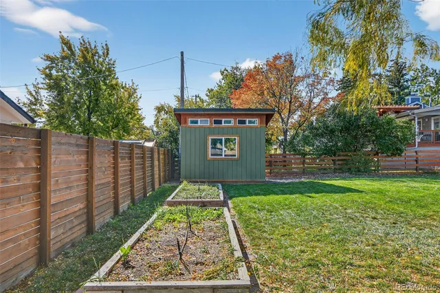 a sign board with yard in front of it