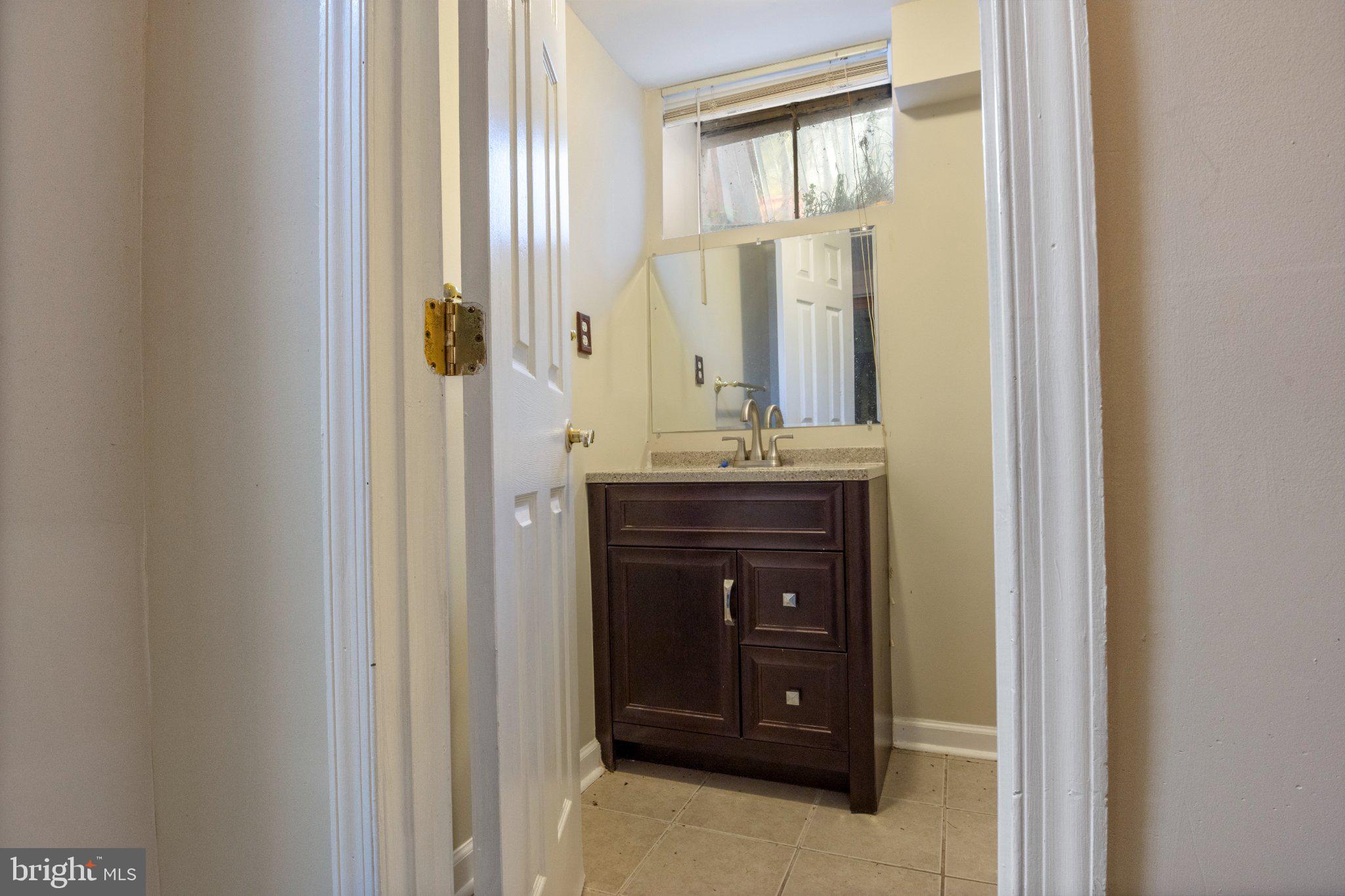 2514 Ritchie Road District Heights, MD 20747 - Photo 20 of 24 Charming bathroom with natural light.
