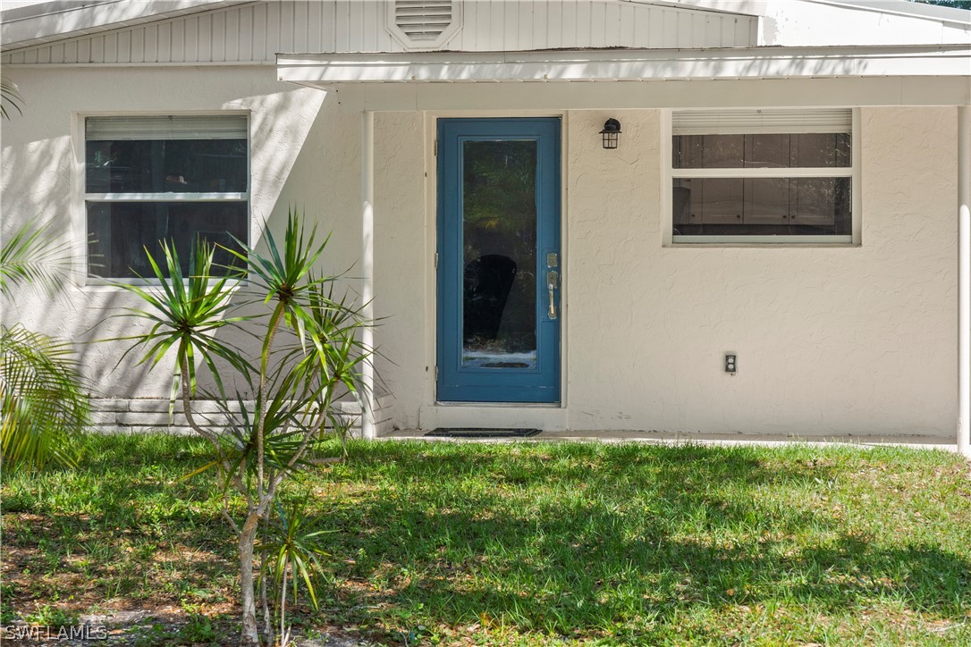 2345 Floyd Street Sarasota, FL 34239 - Photo 24 of 30 a front view of a house with garden