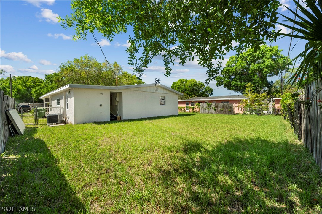 2345 Floyd Street Sarasota, FL 34239 - Photo 27 of 30 a view of a house with backyard and tree
