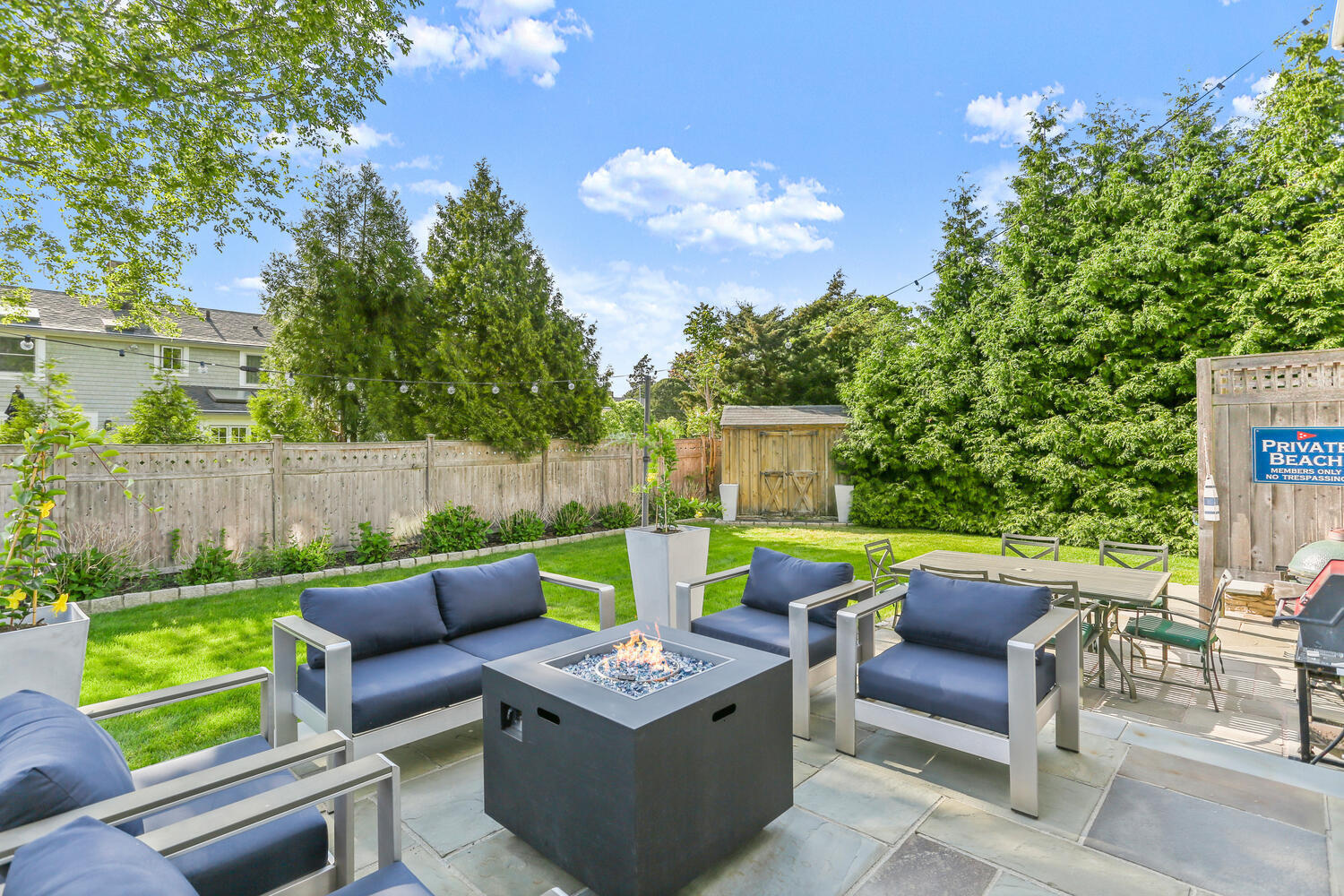6 Mayflower Road Darien, CT 06820 - Photo 23 of 33 a view of an outdoor sitting area with a table and chair