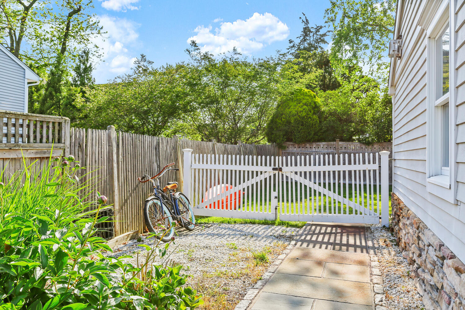 6 Mayflower Road Darien, CT 06820 - Photo 25 of 33 a view of a house with a small yard and plants