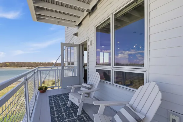 a balcony with furniture