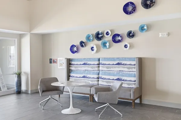 a dining room with furniture and a table