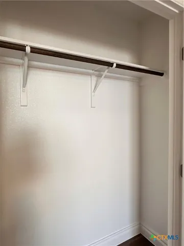 a view of balcony with wooden floor