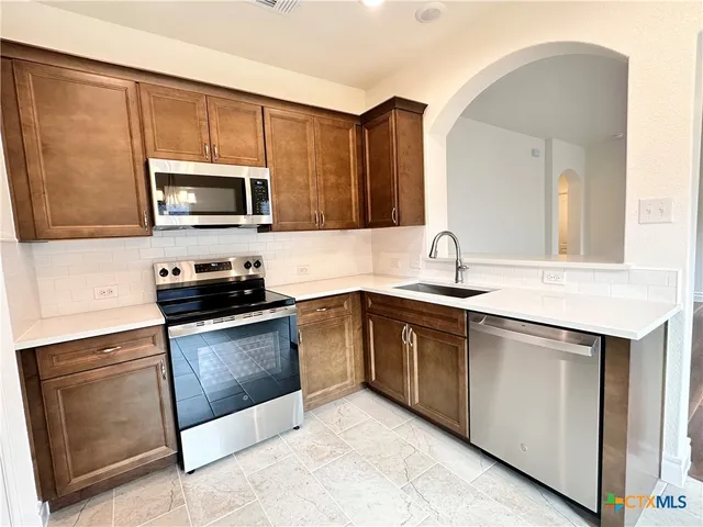 a view of a room with rack on the wall