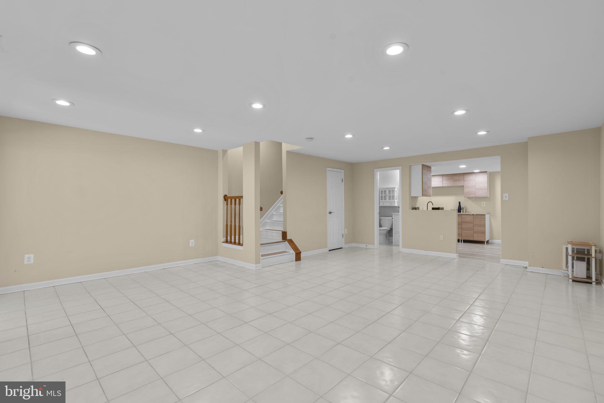 4722 Rams Horn Row Ellicott City, MD 21042 - Photo 38 of 50 Spacious rec room with endless possibilities