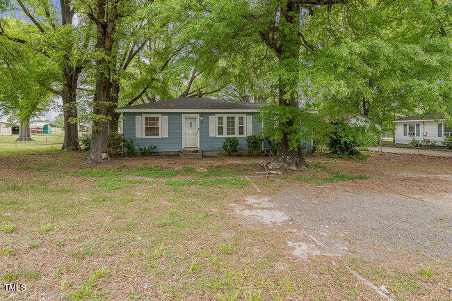 812 Stallings Road Durham, NC 27703 - Photo 3 of 19 a view of a house with a outdoor space