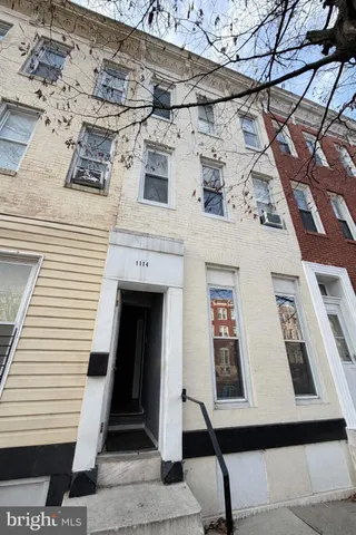 a view of a building with a street