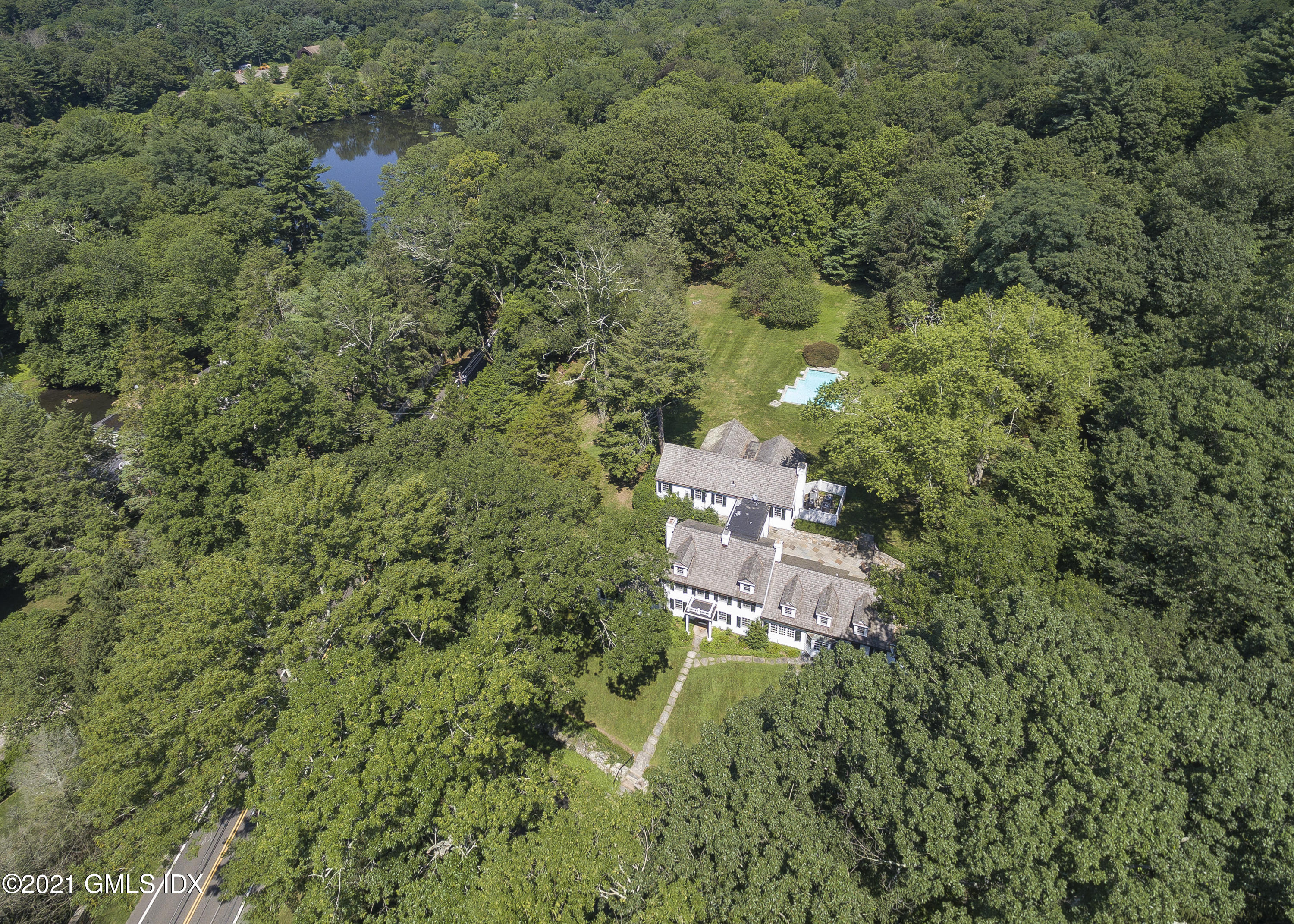 293 Riversville Road Greenwich, CT 06831 - Photo 35 of 38 an aerial view of residential house with outdoor space and trees around
