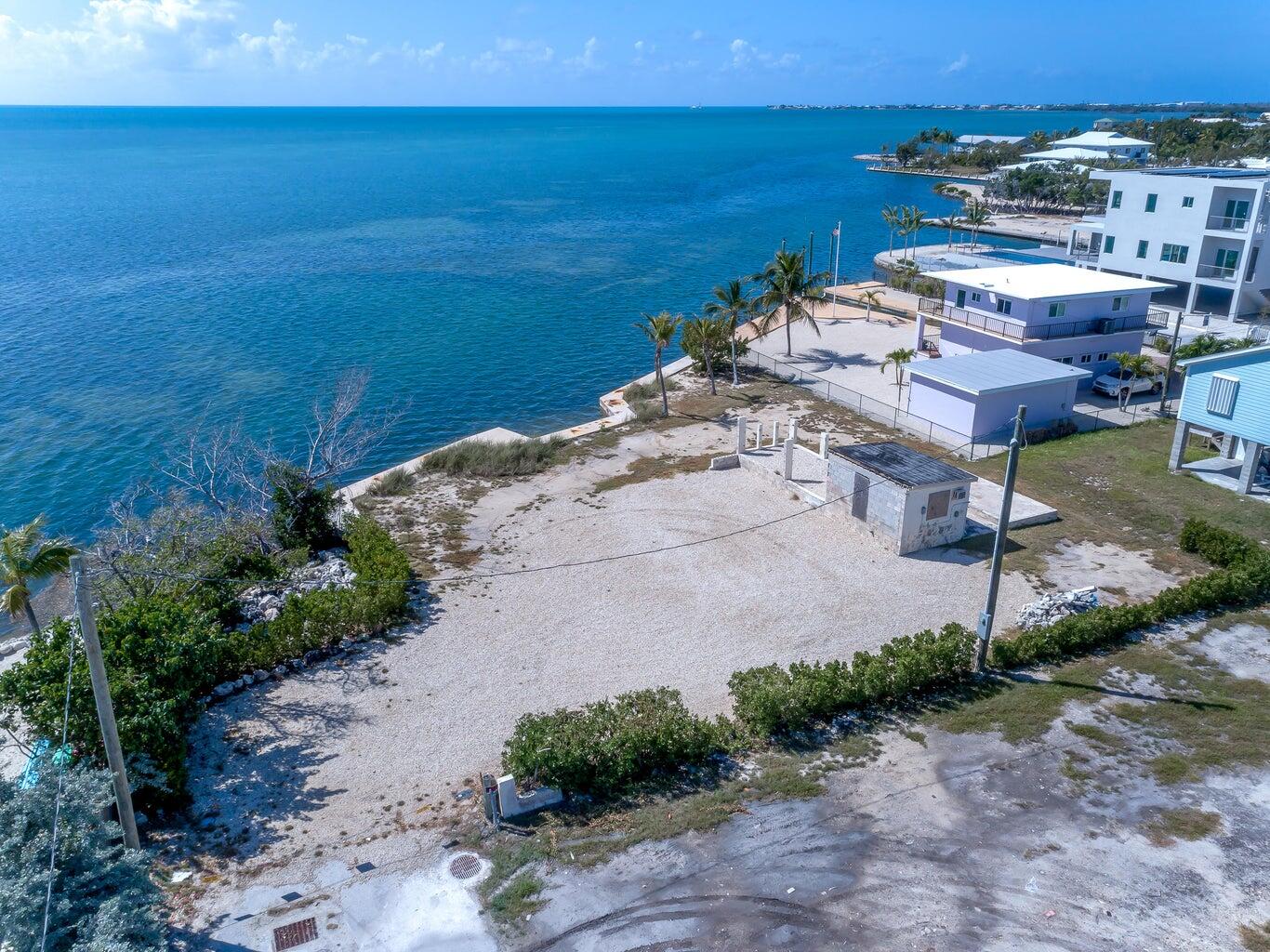 1235 83rd Street Marathon, FL 33050 - Photo 3 of 16 a view of a lake with a yard