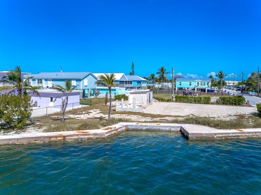 1235 83rd Street Marathon, FL 33050 - Photo 4 of 16 swimming pool view with a lake view