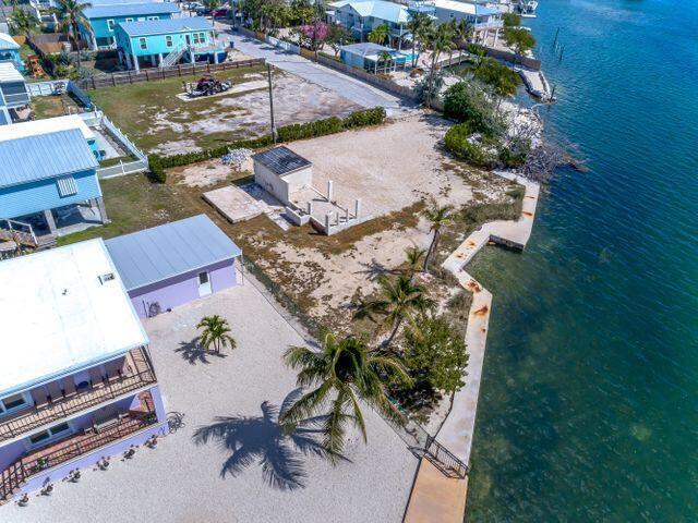 1235 83rd Street Marathon, FL 33050 - Photo 7 of 16 an aerial view of a residential houses with outdoor space