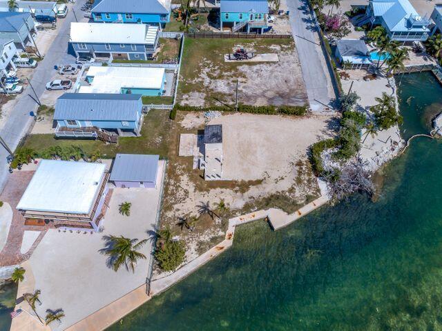 1235 83rd Street Marathon, FL 33050 - Photo 8 of 16 an aerial view of residential houses with outdoor space and swimming pool