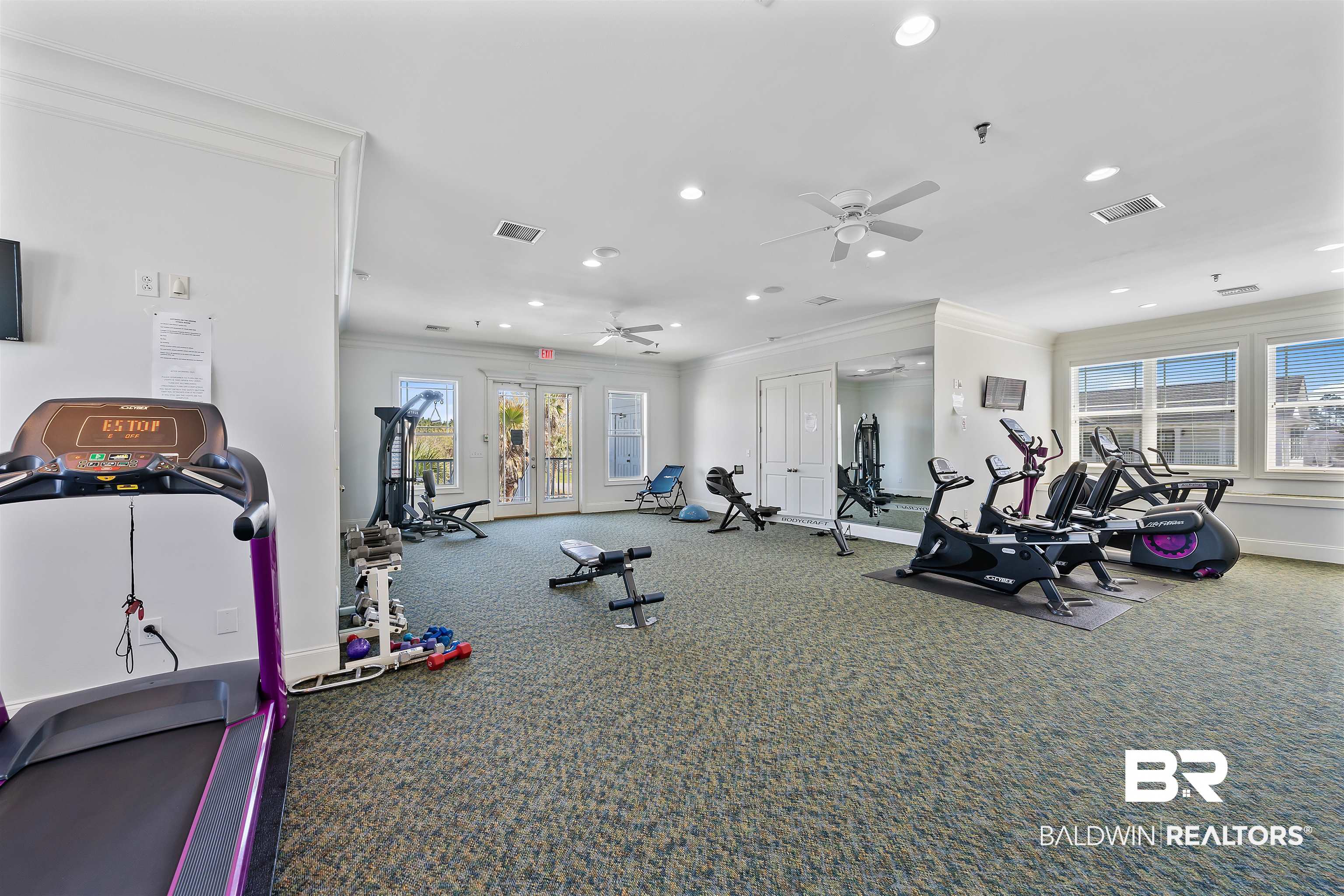 1221 Primrose Lane Foley, AL 36535 - Photo 27 of 29 Workout area with ornamental molding, baseboards, visible vents, and ceiling fan