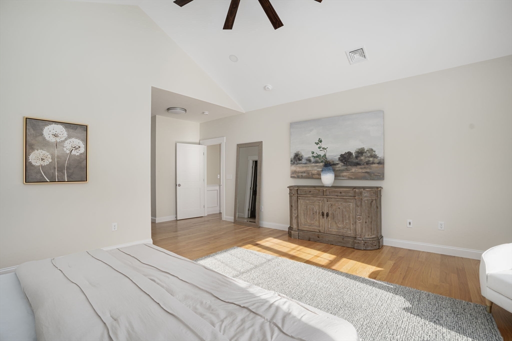 660 Pine Street Seekonk, MA 02771 - Photo 20 of 37 a bedroom with a bed and painting on the wall