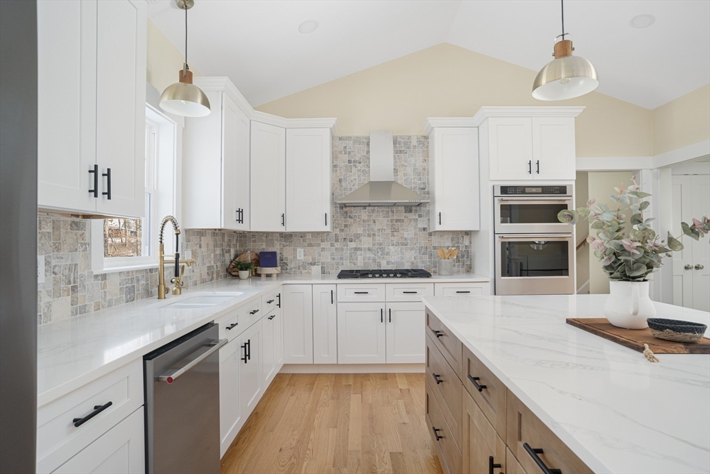 660 Pine Street Seekonk, MA 02771 - Photo 2 of 37 a kitchen with a sink stove and refrigerator