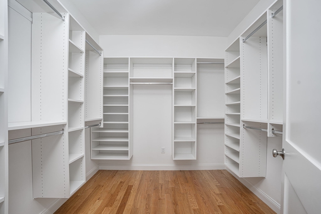 660 Pine Street Seekonk, MA 02771 - Photo 21 of 37 a view of walk in closet with empty racks
