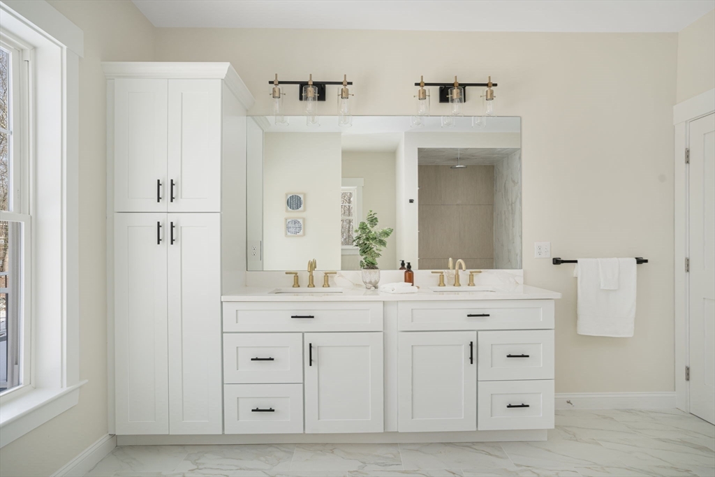 660 Pine Street Seekonk, MA 02771 - Photo 22 of 37 a bathroom with a double vanity sink mirror and