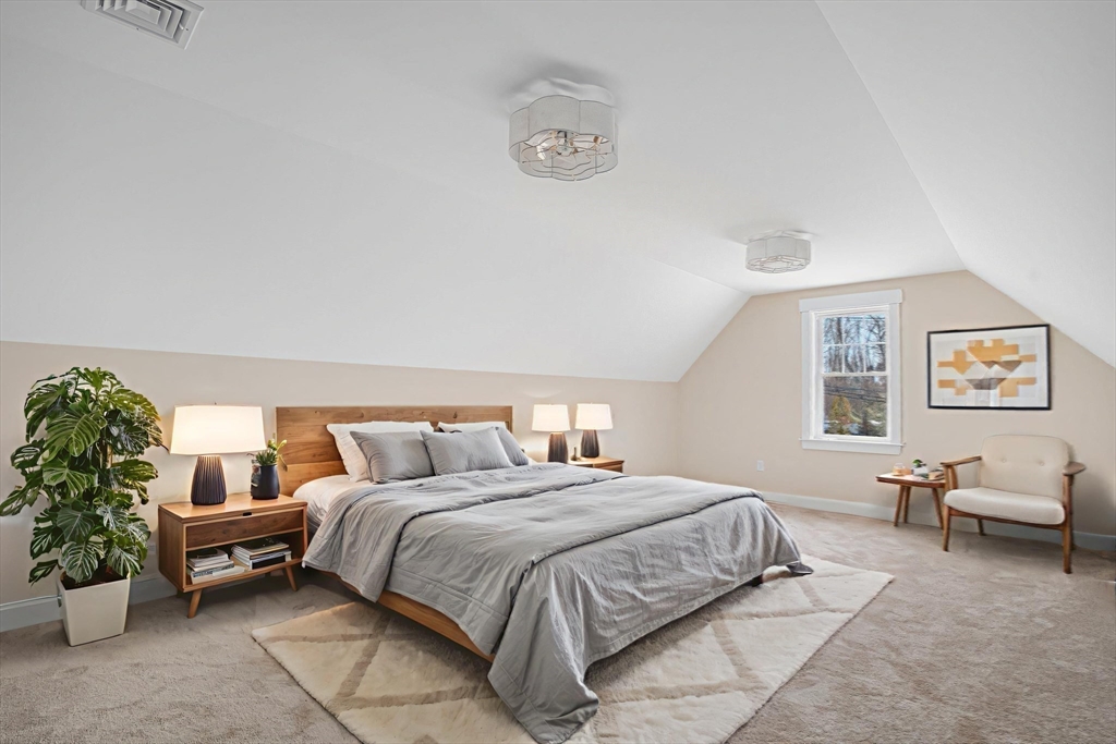 660 Pine Street Seekonk, MA 02771 - Photo 29 of 37 a bedroom with a bed and a couch