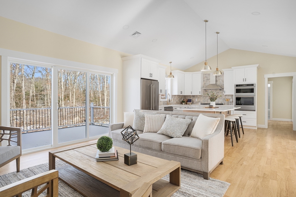 660 Pine Street Seekonk, MA 02771 - Photo 7 of 37 a living room with furniture and a large window