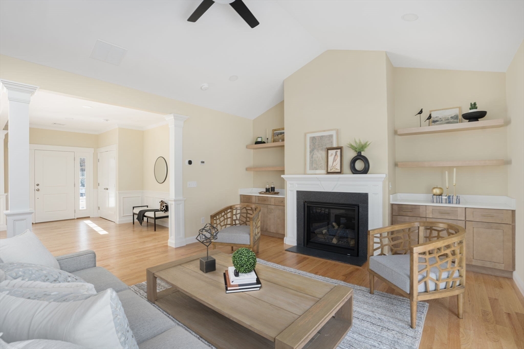 660 Pine Street Seekonk, MA 02771 - Photo 9 of 37 a living room with furniture and a fireplace