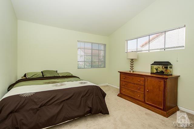 5833 Cochran Street Simi Valley, CA 93063 - Photo 11 of 28 a bedroom with a bed and a window