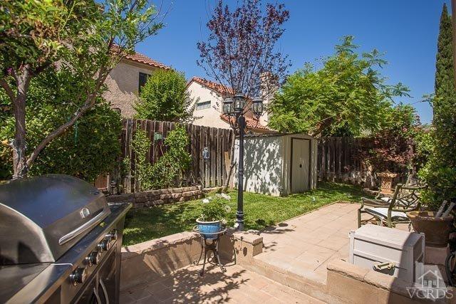 5833 Cochran Street Simi Valley, CA 93063 - Photo 17 of 28 a view of a bench in the garden
