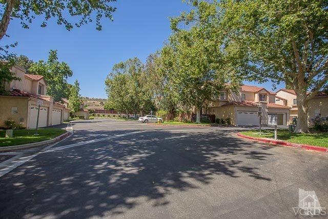 5833 Cochran Street Simi Valley, CA 93063 - Photo 20 of 28 a view of road with large trees