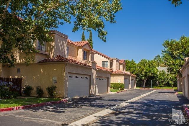 5833 Cochran Street Simi Valley, CA 93063 - Photo 28 of 28 a front view of a house with a yard