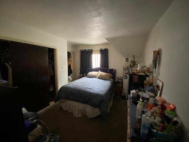 1038 Ridge Avenue Coraopolis, PA 15108 - Photo 14 of 17 a bedroom with a bed and a large mirror