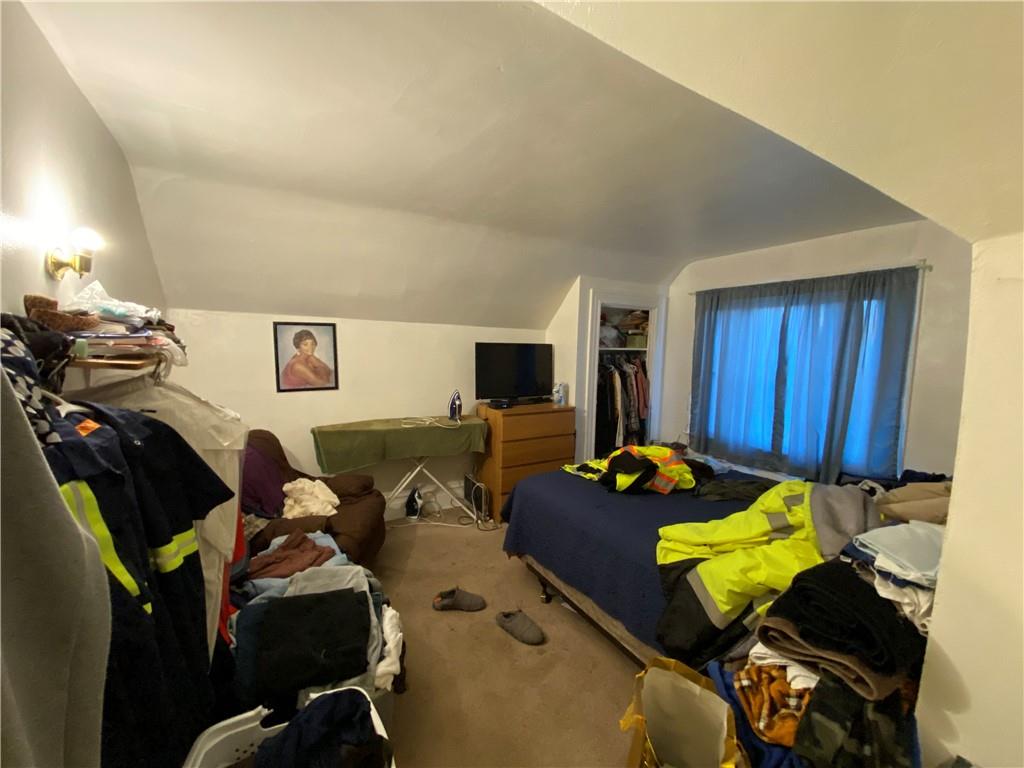 1038 Ridge Avenue Coraopolis, PA 15108 - Photo 16 of 17 a living room with furniture and a flat screen tv