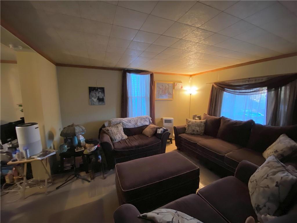 1038 Ridge Avenue Coraopolis, PA 15108 - Photo 10 of 17 a living room with furniture and a window