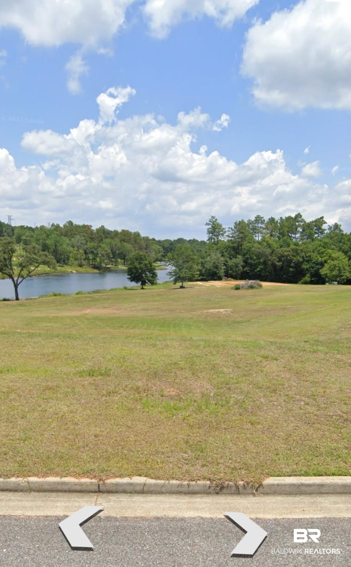 0 Silver Maple Drive Mobile, AL 36619 - Photo 1 of 3 View of green lawn with a water view