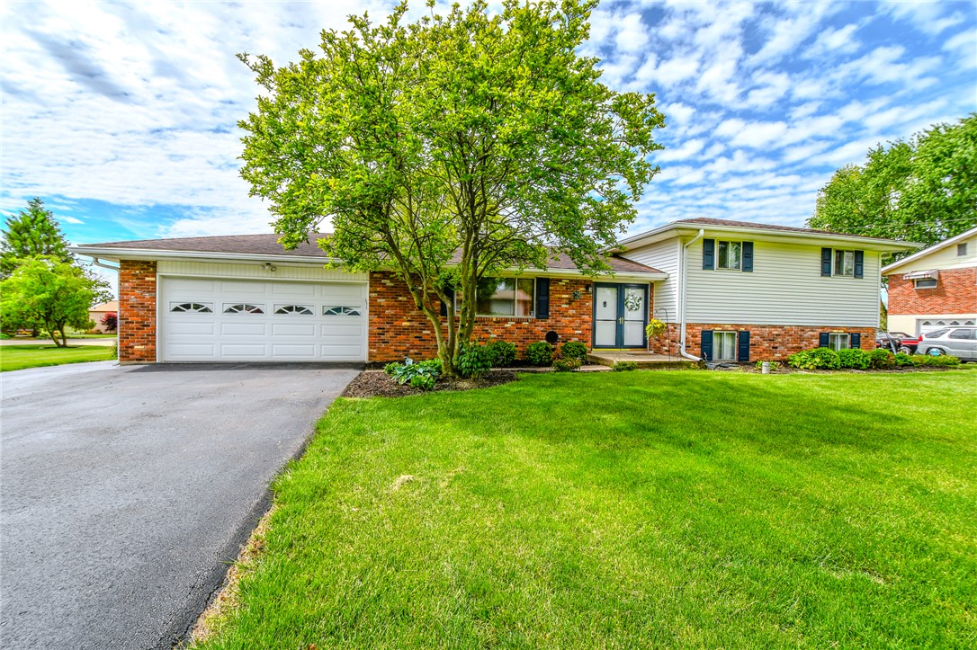 This charming home offers a well-maintained exterior and a welcoming facade.