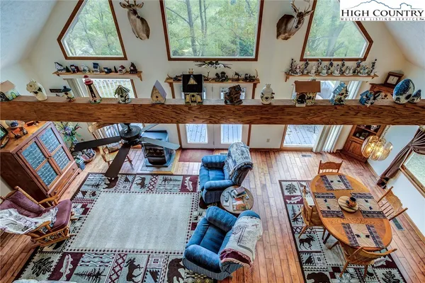a bedroom with furniture and a window