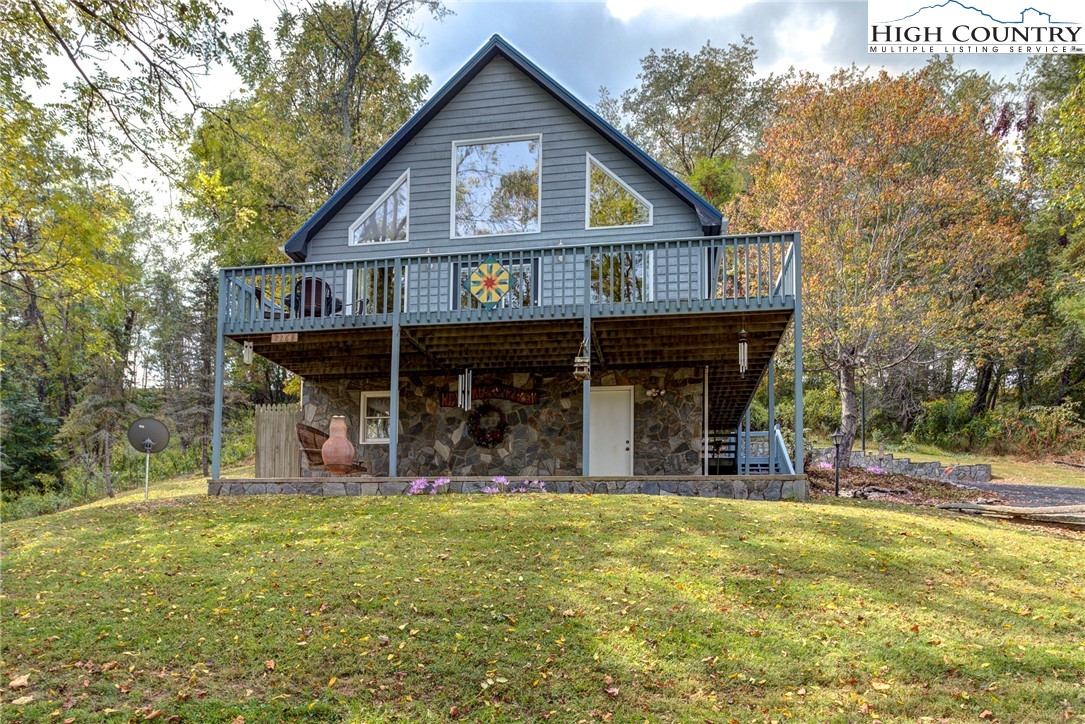 2164 River Bend Road Mouth Of Wilson, VA 24363 - Photo 3 of 50 a front view of a house with garden