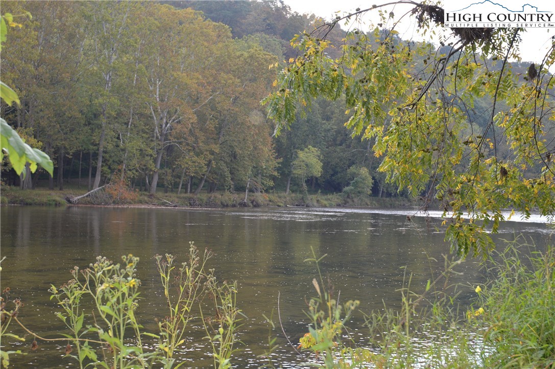 2164 River Bend Road Mouth Of Wilson, VA 24363 - Photo 50 of 50 a view of a lake with a yard