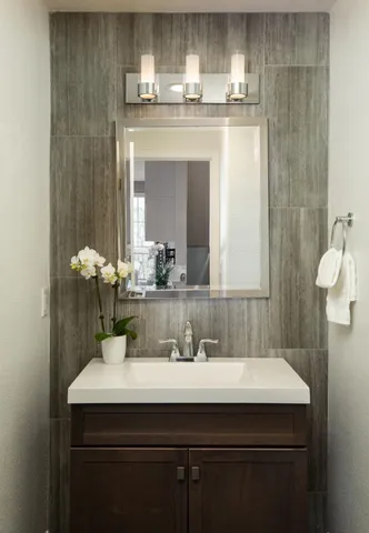 a bathroom with a sink and mirror