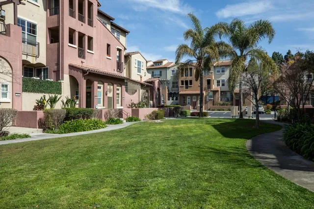 a view of a building with a yard