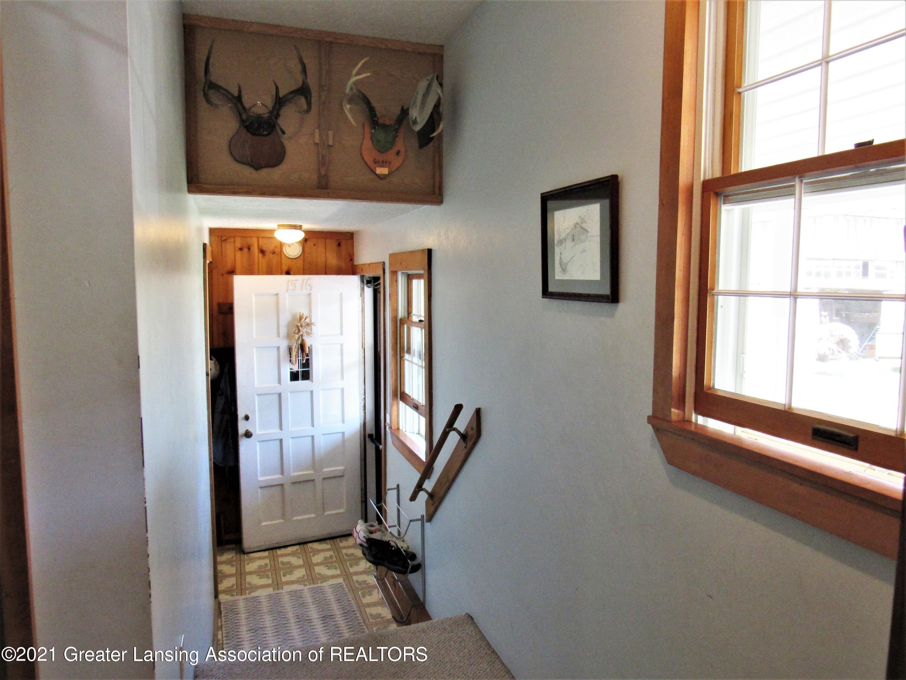 13567 Oneida Road Grand Ledge, MI 48837 - Photo 13 of 46 Side Foyer and Hall