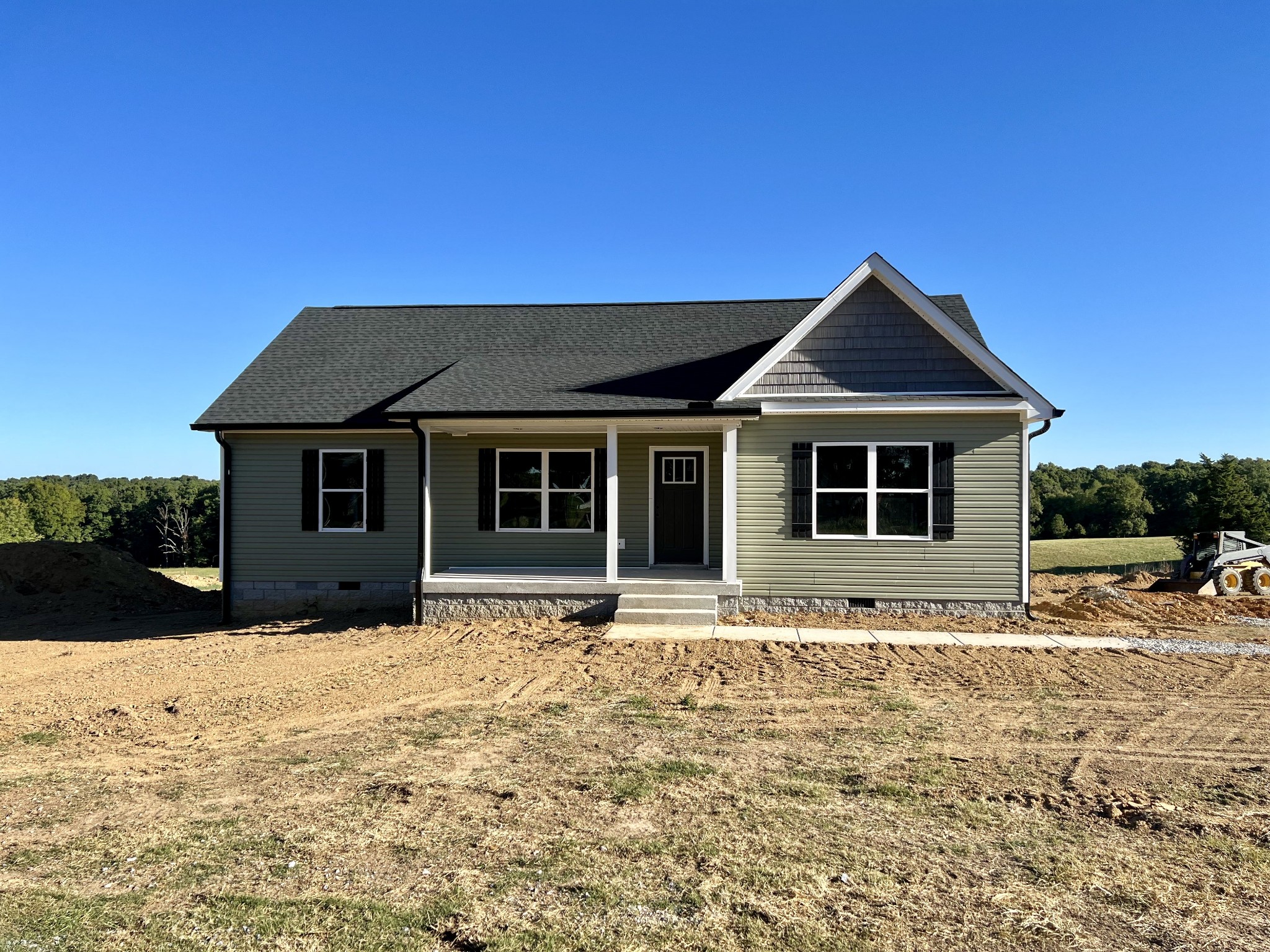 808 Jason Chapel Road Dickson, TN 37055 - Photo 11 of 11 a front view of a house with a yard