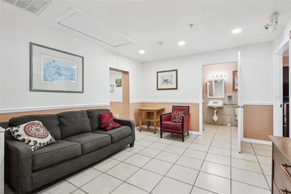 a living room with furniture and a couch