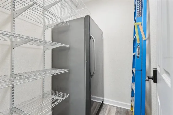 a view of storage and utility room